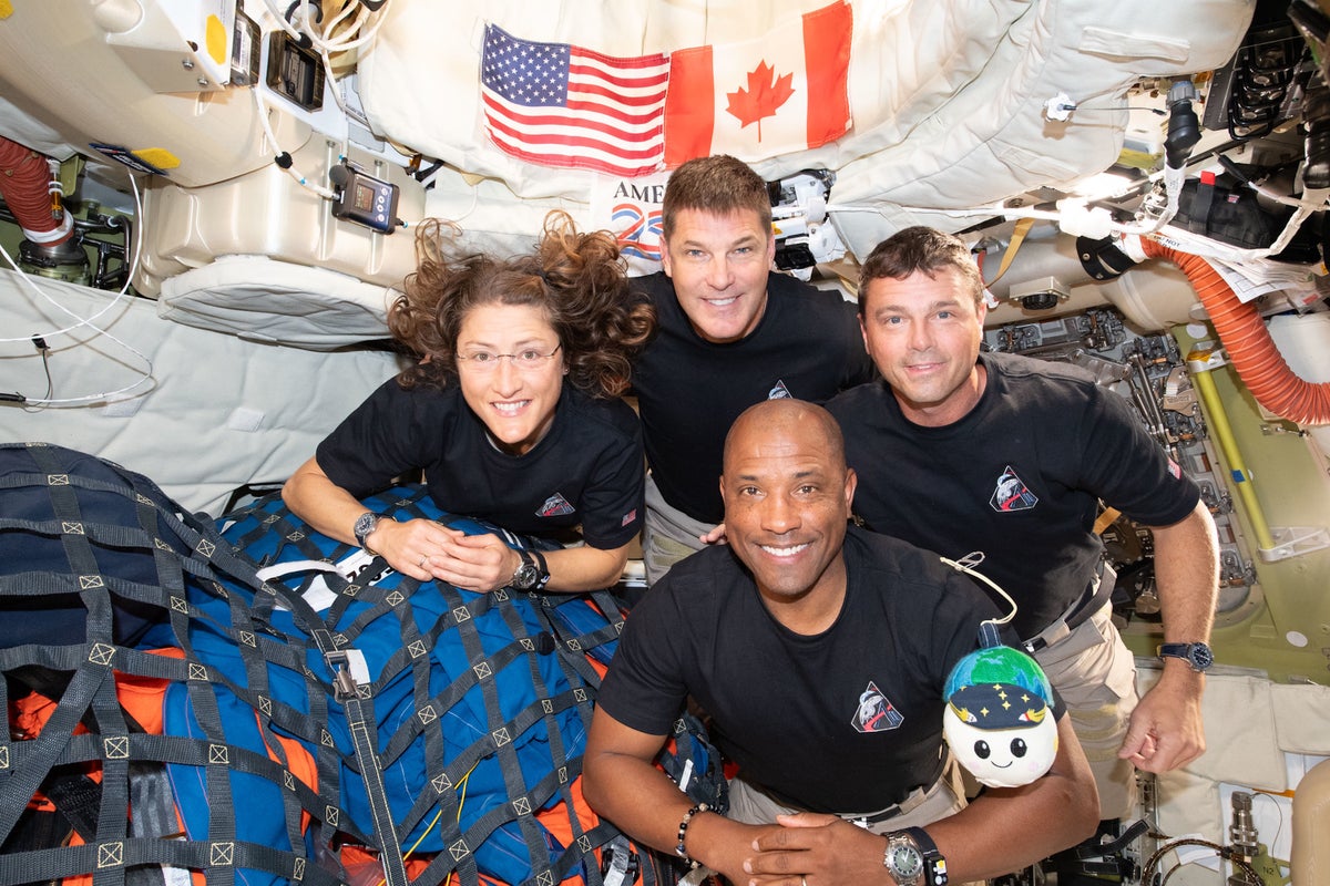 NASA’s Artemis II crew (from left to right) mission specialist Christina Koch, mission speciali...