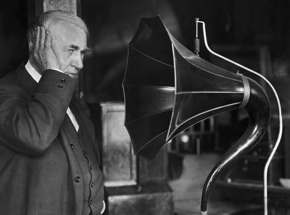 Thomas A. Edison listens to a phonograph in 1911. Bettmann / Contributor / Getty
