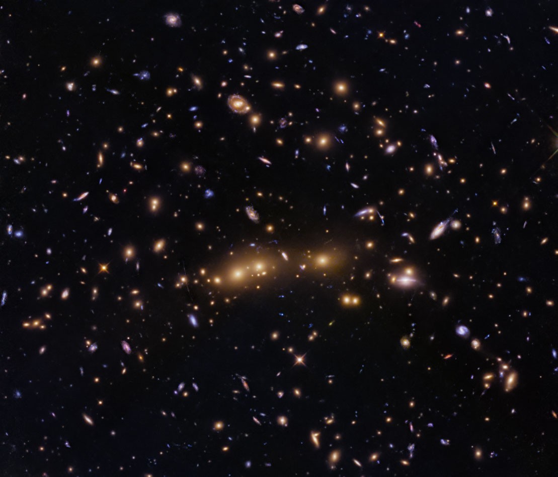 cq5dam.web_.1280.1280-7 NASA, ESA, H. Ebeling (University of Hawaii), D. Coe (STScI, ESA, JWST); Image Processing: G. Kob...