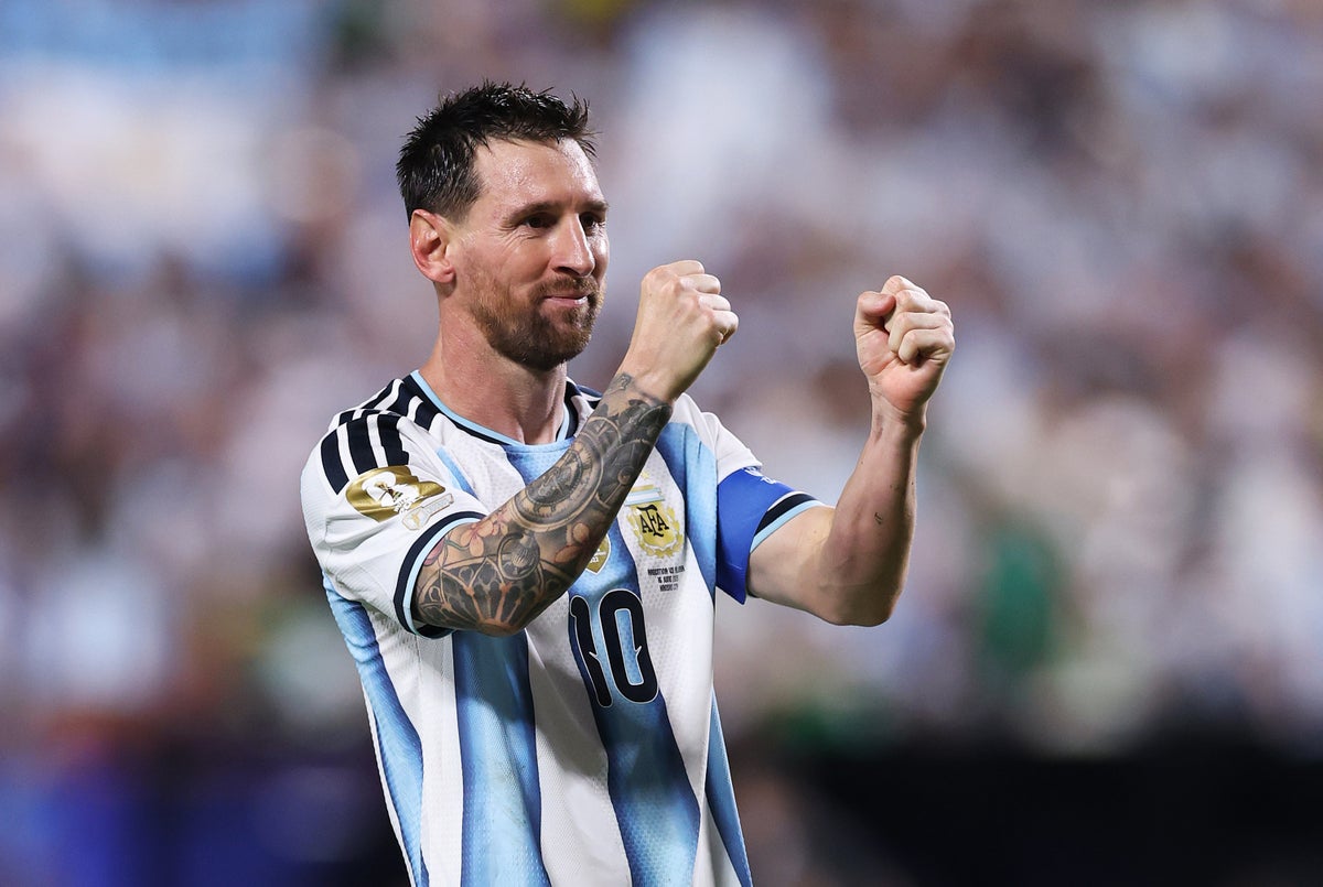 Lionel Messi #10 of Argentina celebrates scoring his team's third and hat trick goal during the F...