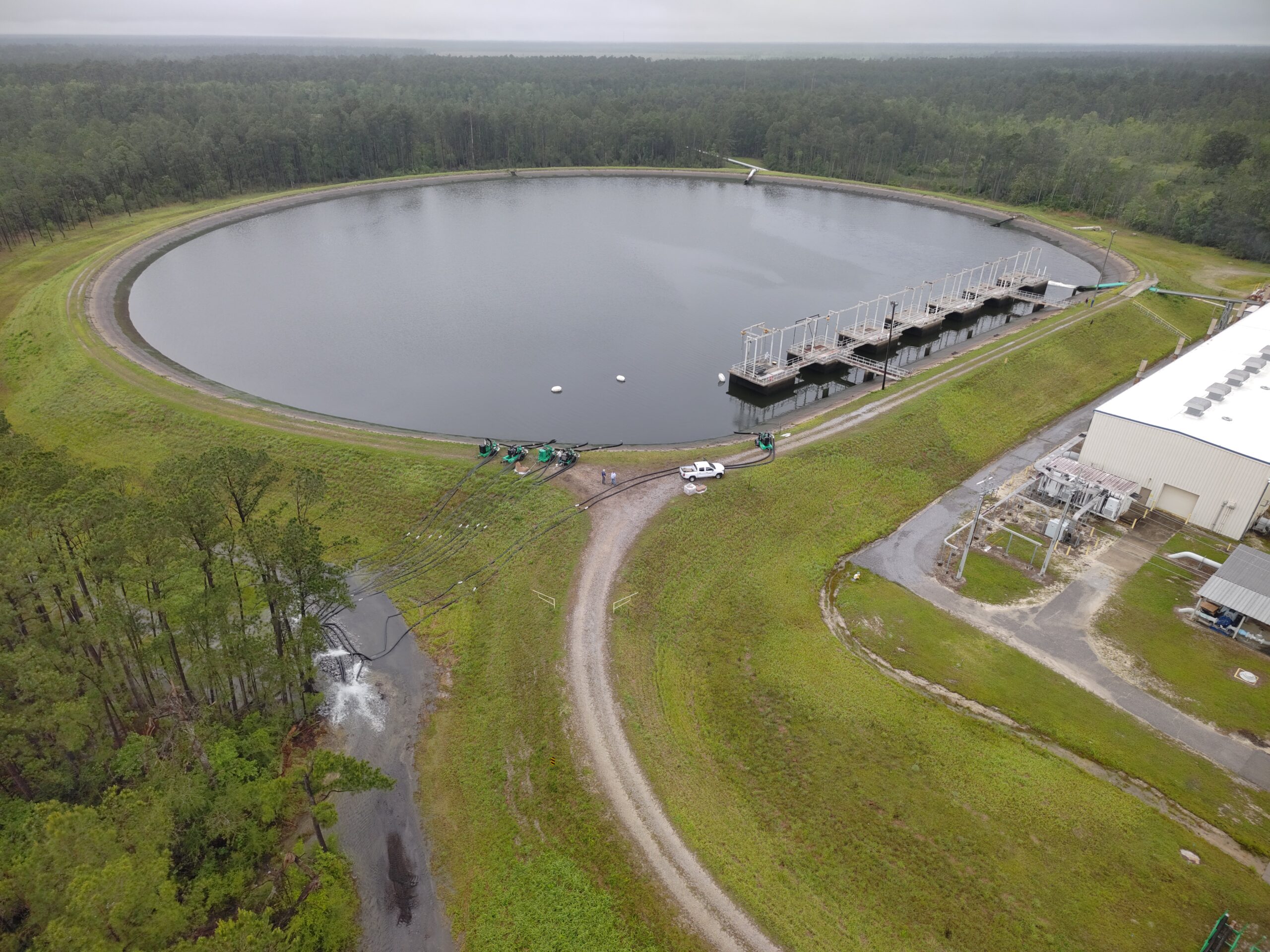 A drone image shows the High Pressure Industrial Water Facility’s 66-million-gallon reservoir a...