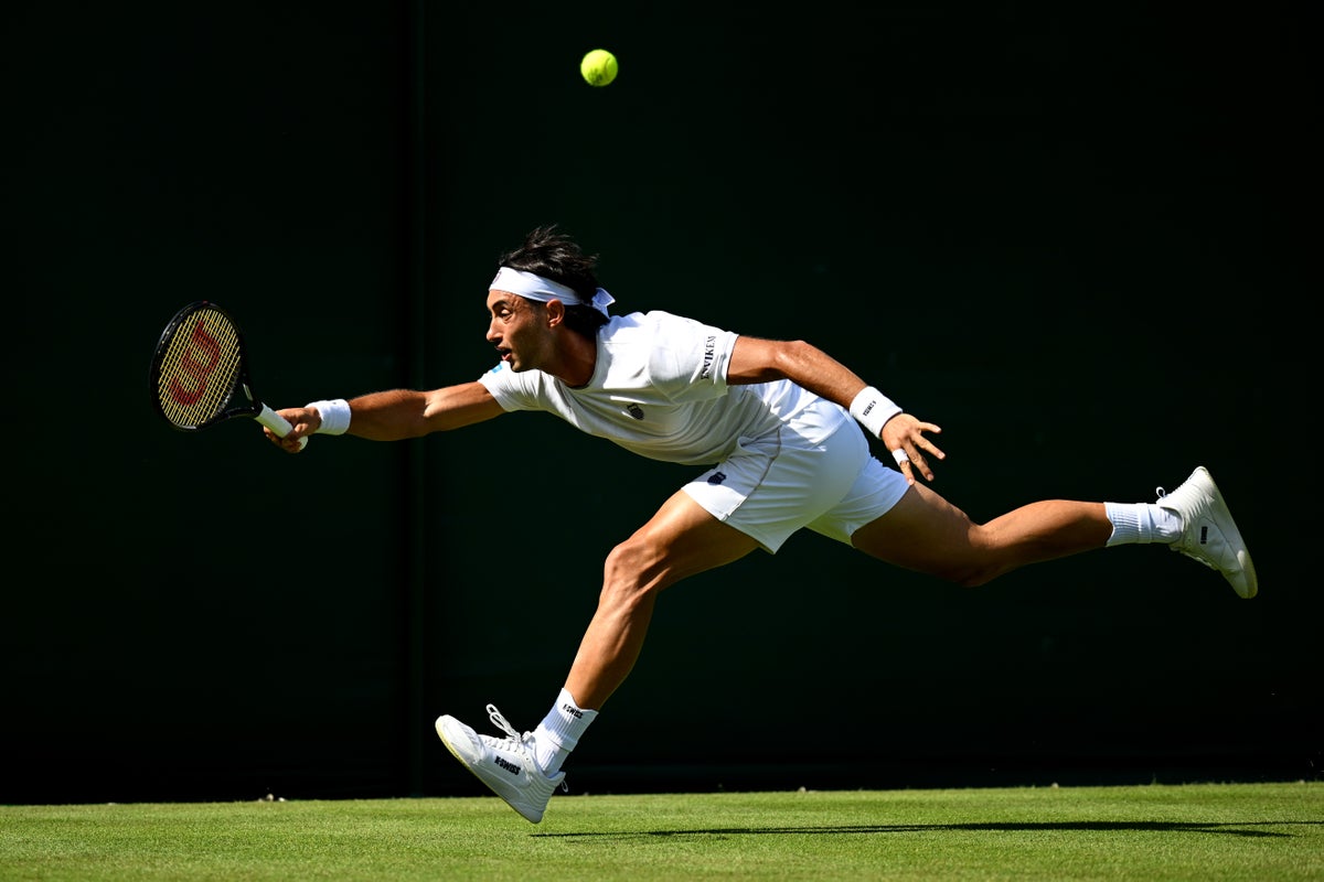 wimbledon Thiago Agustin Tirante of Argentina plays a forehand against Fabian Marozsan of Hungary during th...