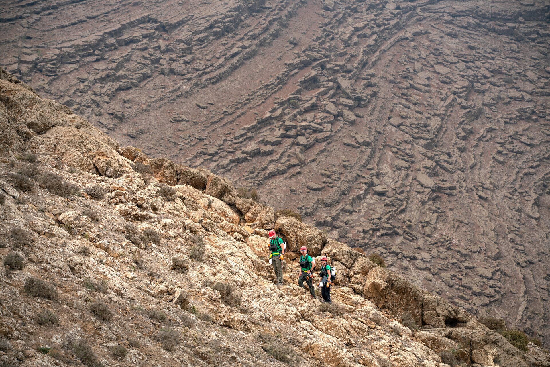 Space_explorers_in_the_land_of_volcanoes_pillars Space explorers in the land of volcanoes