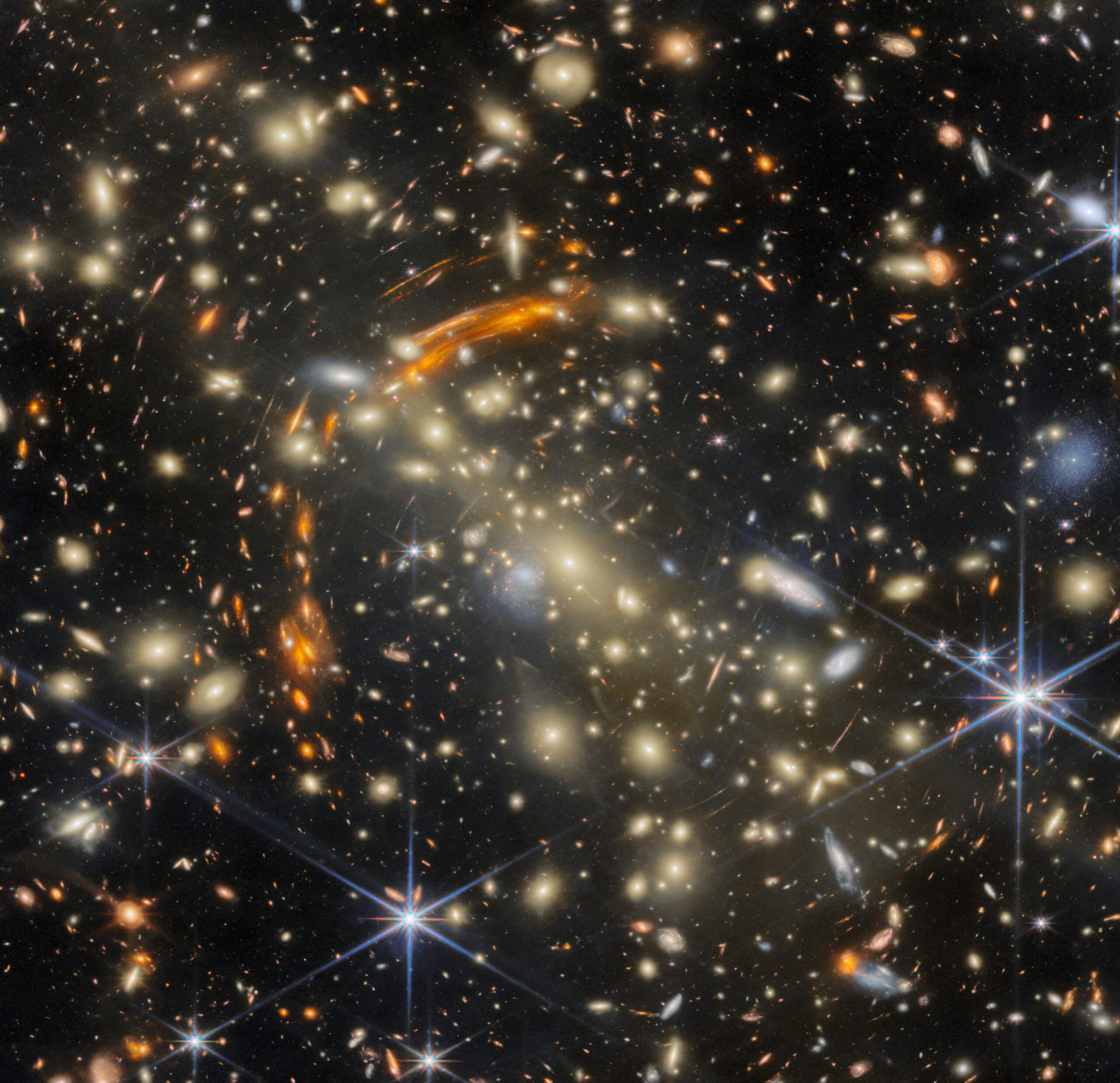 55558916046-731625cbe5-o A massive galaxy cluster, made of many golden elliptical galaxies with the largest, brightest one...