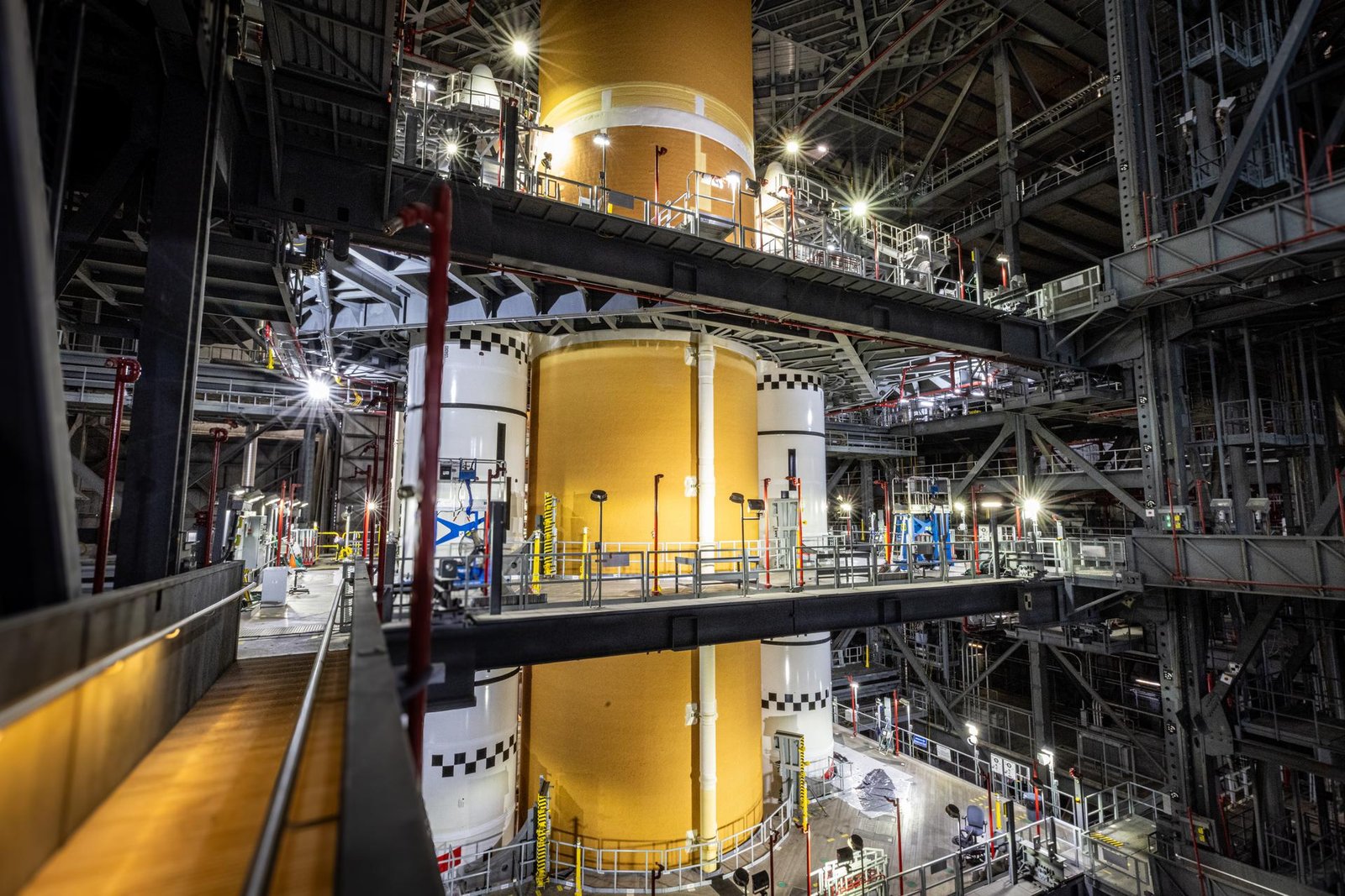 The SLS (Space Launch System) rocket core stage is integrated with the solid rocket boosters for ...