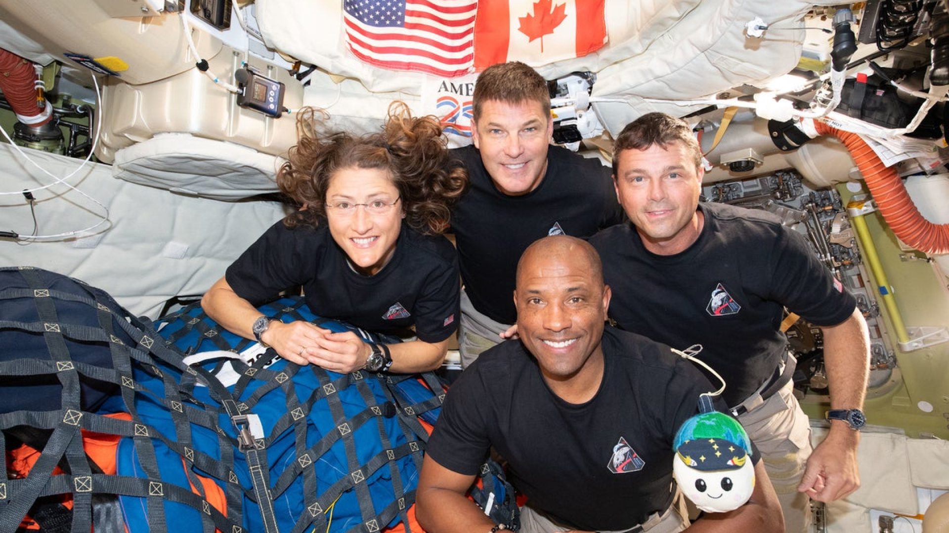 NASA’s Artemis II crew (from left to right) mission specialist Christina Koch, mission speciali...