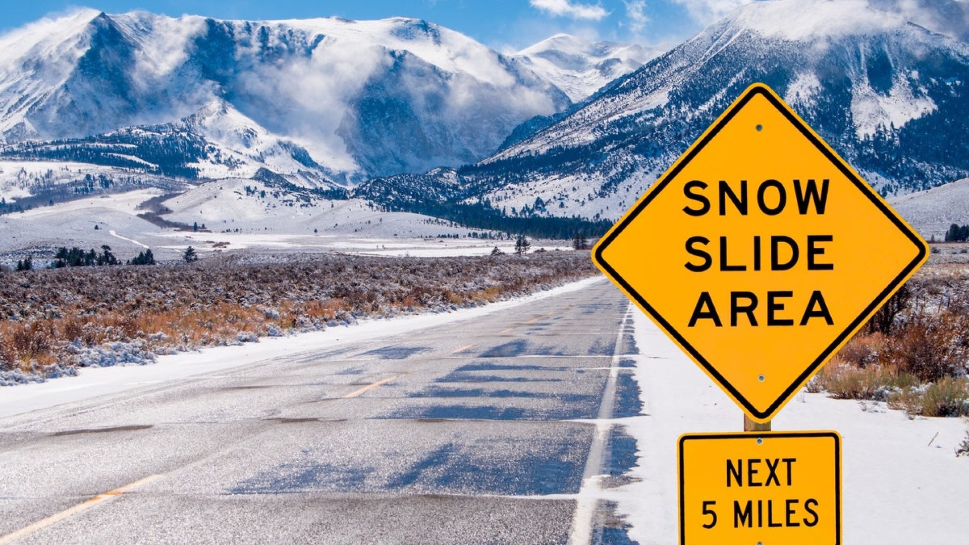Motorists are warned of dangerous driving conditions on a road leading into the Sierra Nevada Mou...