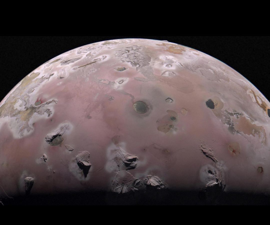 A view of half of the sphere of Jupiter’s volcanic moon Io against black space. The surface is ...