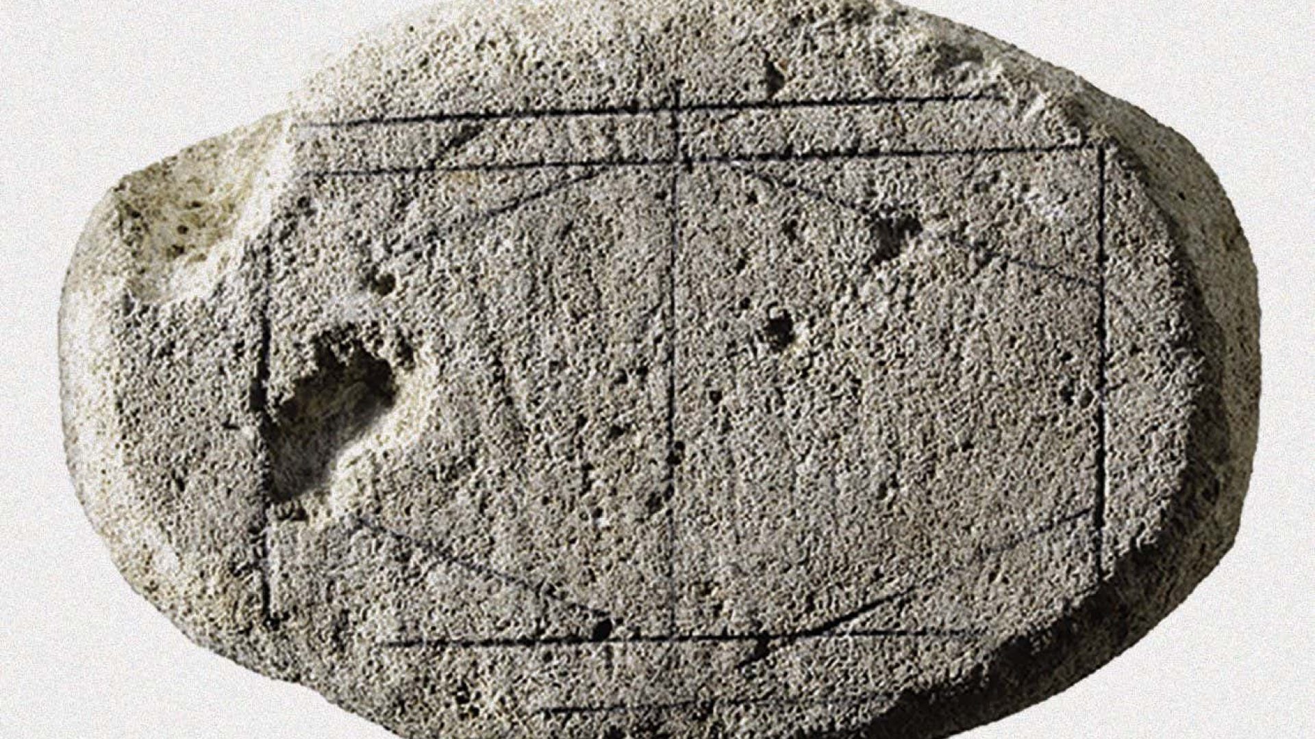 The possible game board with pencil marks highlighting the incised linesHet Romeins Museum