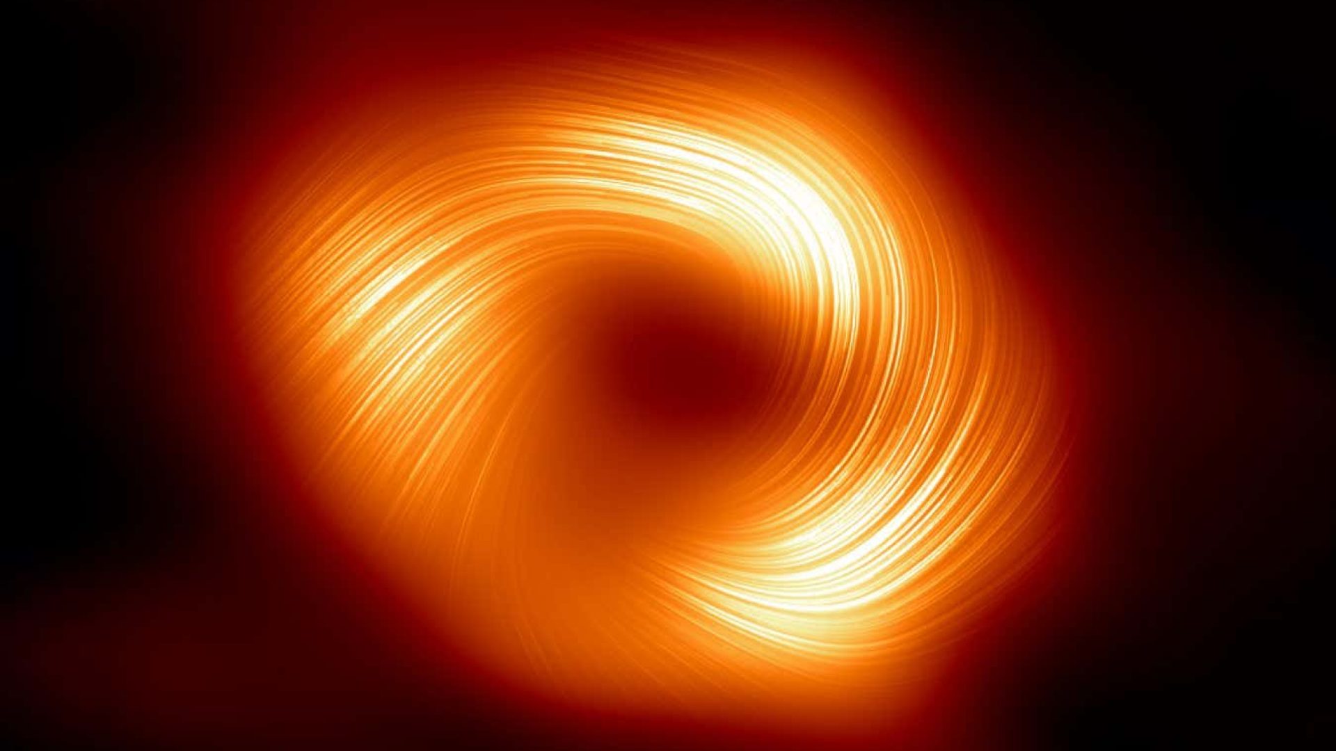 An image of the supermassive black hole Sagittarius A* in polarised light, captured by the Event ...