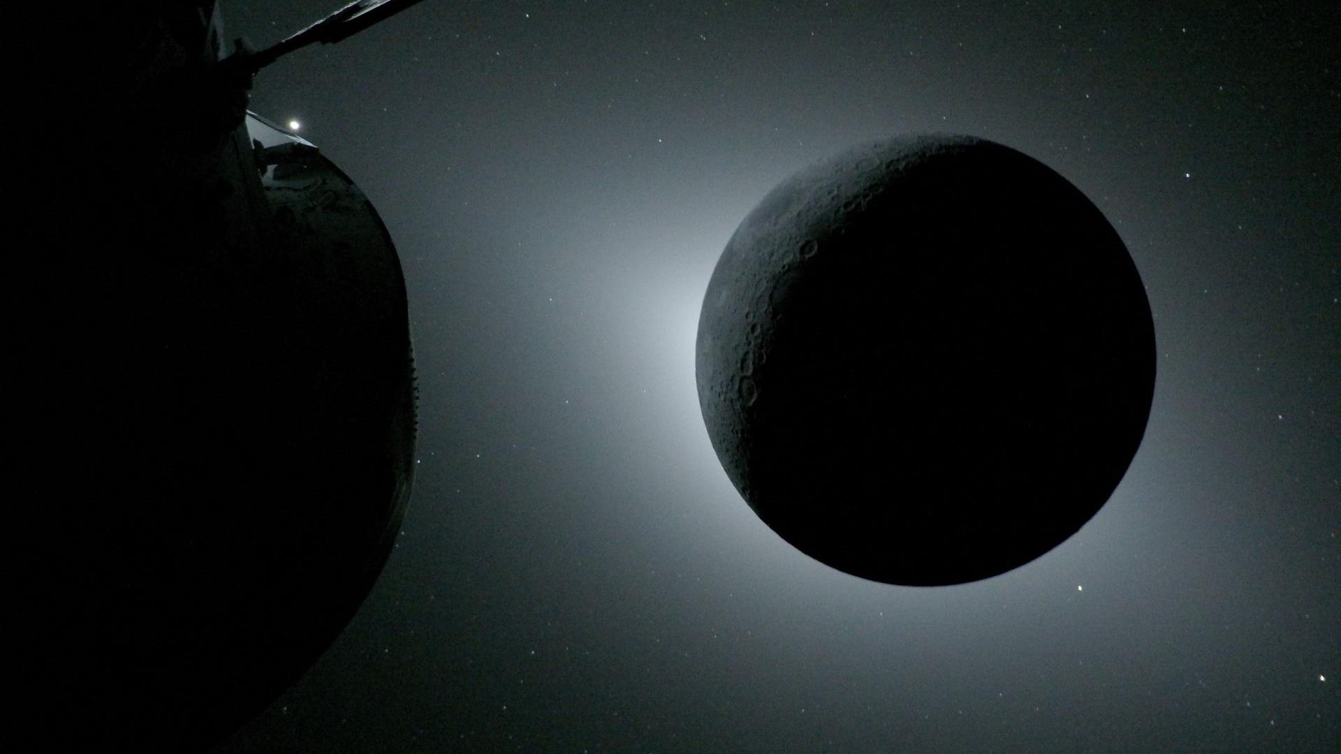 The Moon, backlit by the Sun during a solar eclipse, is photographed by NASA’s Orion spacecraft...