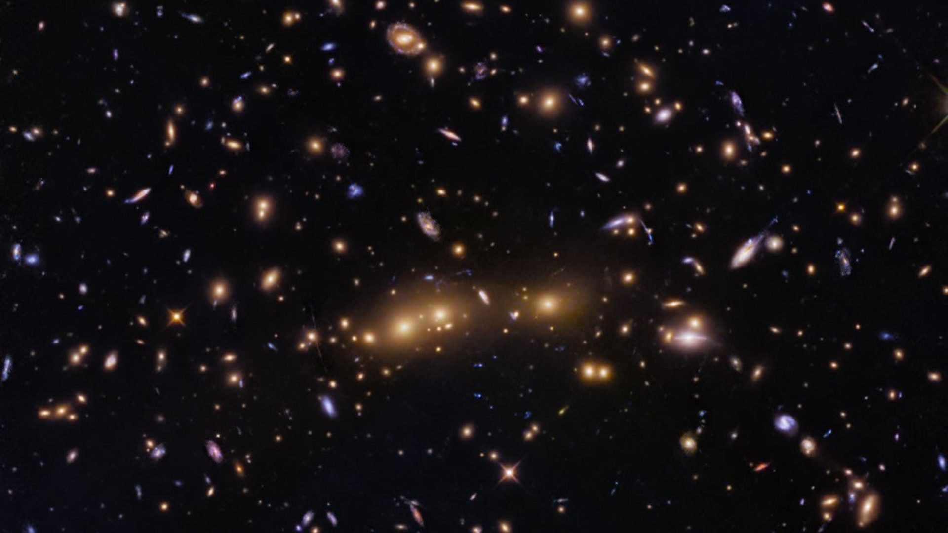 NASA, ESA, H. Ebeling (University of Hawaii), D. Coe (STScI, ESA, JWST); Image Processing: G. Kob...