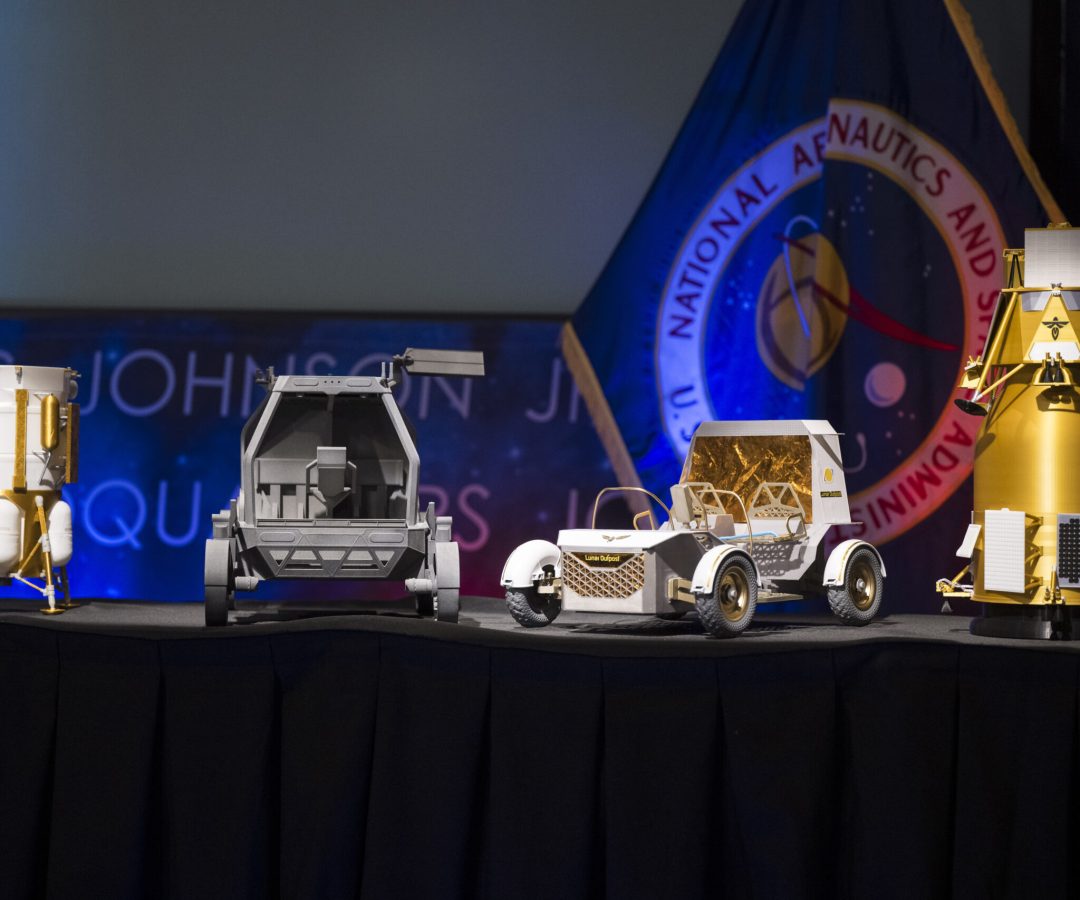 From left to right, models of the Blue Origin Mark 1 Lunar Lander, Astrolab Crewed Lunar Rover, L...