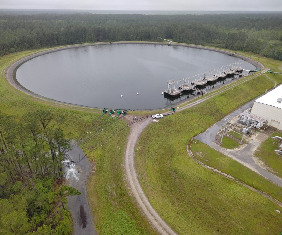 A drone image shows the High Pressure Industrial Water Facility’s 66-million-gallon reservoir a...